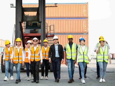 corporate-logistic-team-walking-together-at-contai-2025-03-05-03-55-19-utc (1)