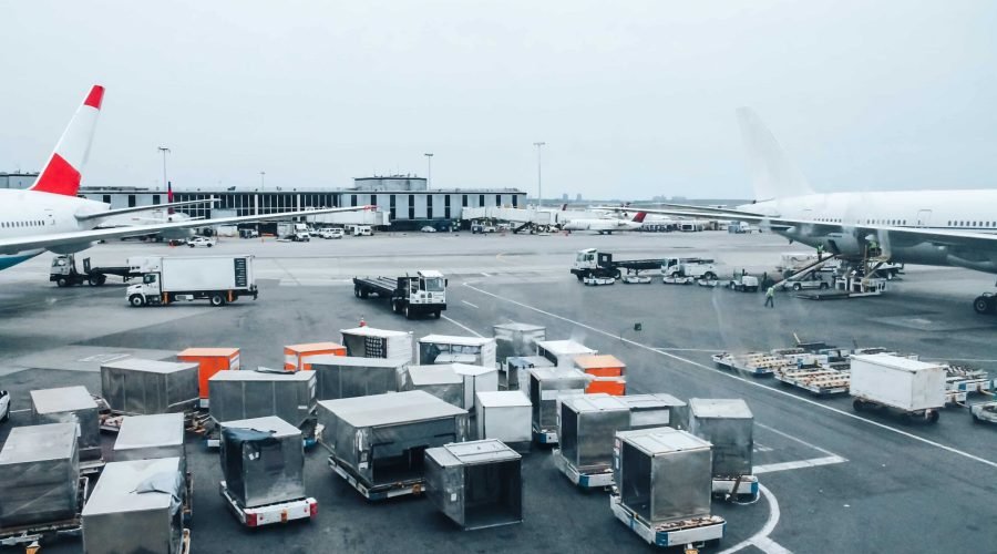 large-airport-with-cars-containers-and-planes-2025-02-12-18-37-48-utc (1)